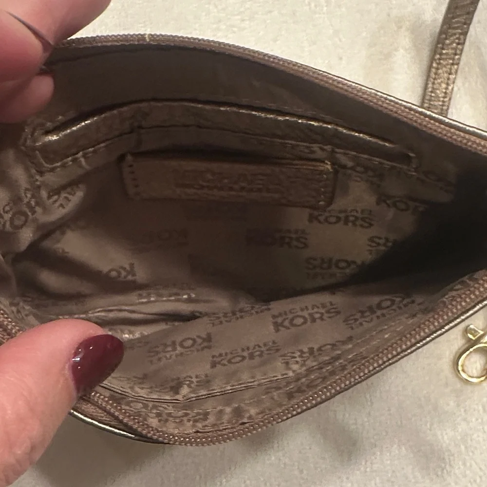 Michael Kors Shimmering Gold Wristlet‎